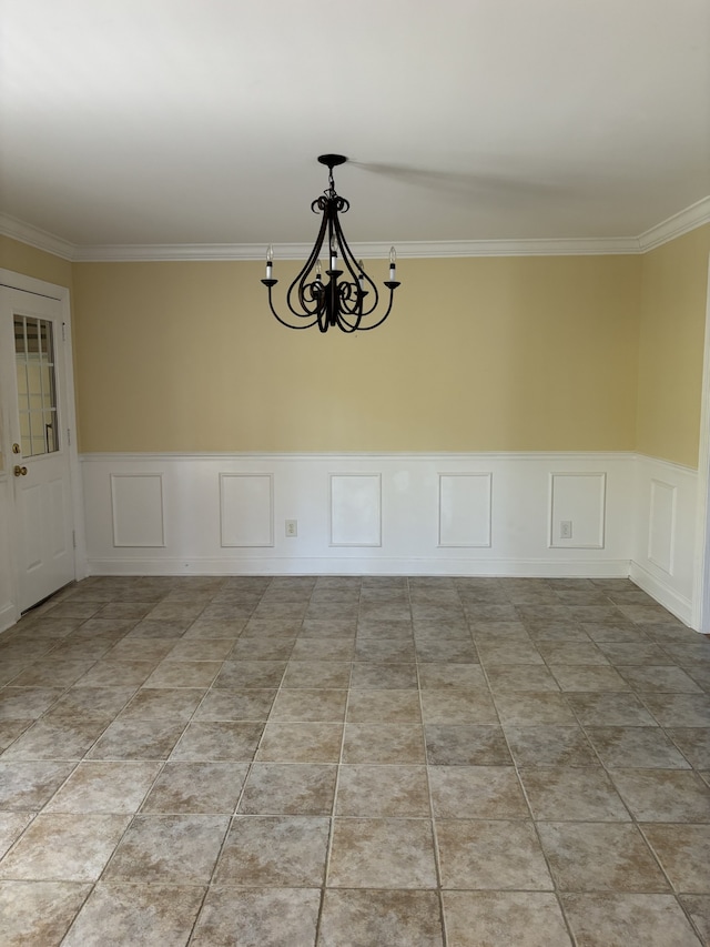 unfurnished dining area featuring crown molding