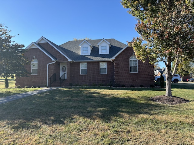 view of front of home featuring a front yard