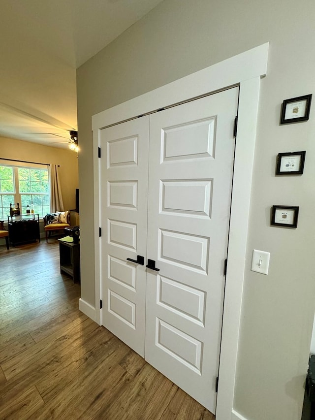 corridor featuring hardwood / wood-style flooring