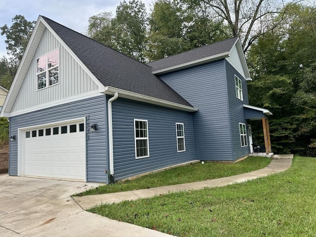 view of side of home featuring a lawn