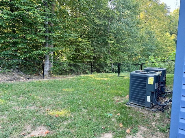 view of yard featuring central air condition unit