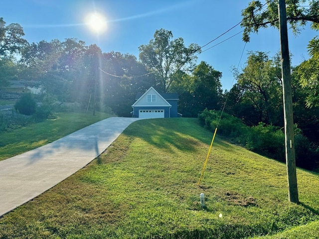 view of yard with a garage