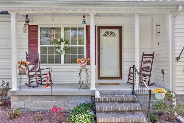 entrance to property with a porch