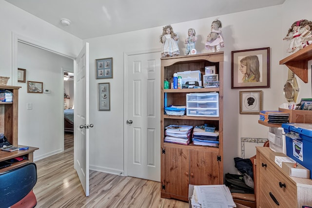 office area with light wood-type flooring