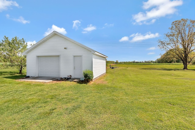 garage with a lawn