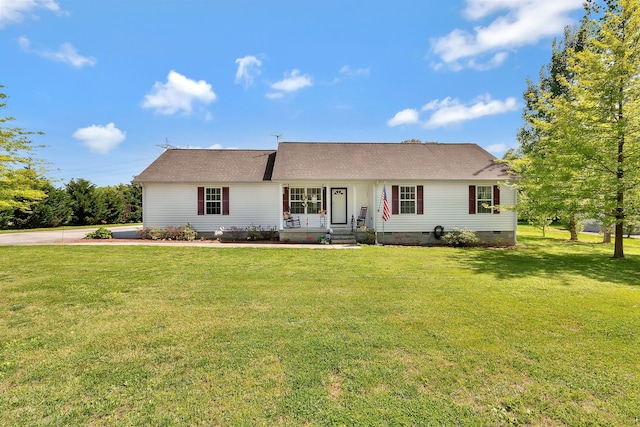 ranch-style house featuring a front yard