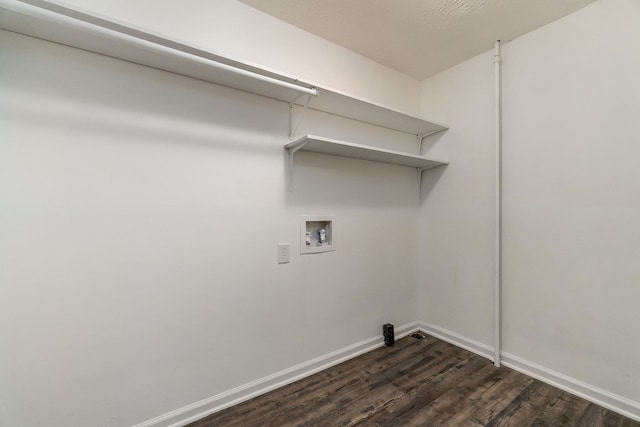 washroom with hookup for a washing machine and dark hardwood / wood-style floors