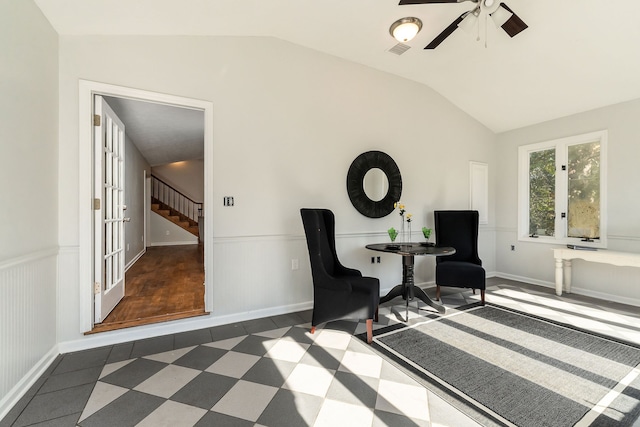 sitting room featuring vaulted ceiling, ceiling fan, and dark hardwood / wood-style flooring