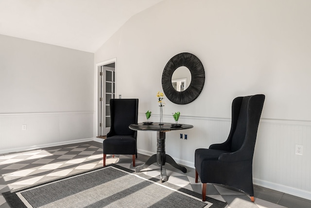 sitting room featuring lofted ceiling