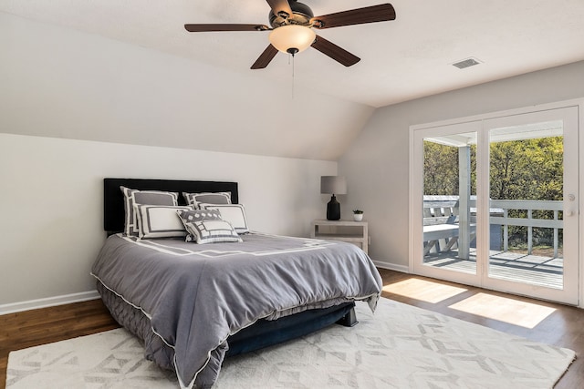 bedroom with vaulted ceiling, hardwood / wood-style flooring, access to outside, and ceiling fan