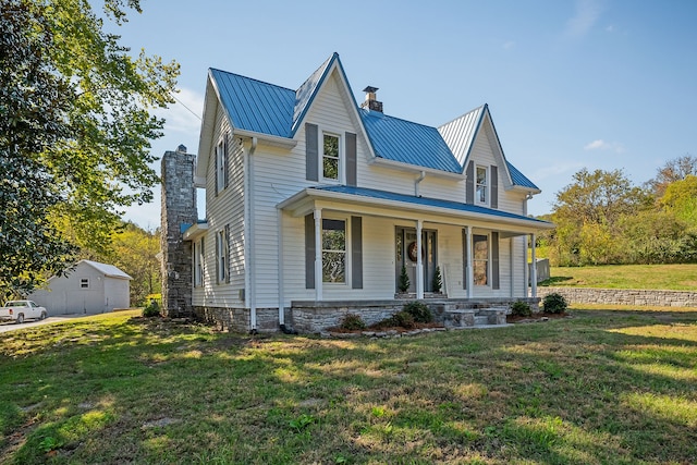 view of front facade with a porch and a front lawn