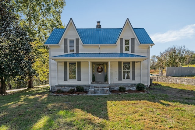 view of front of house with a porch and a front yard