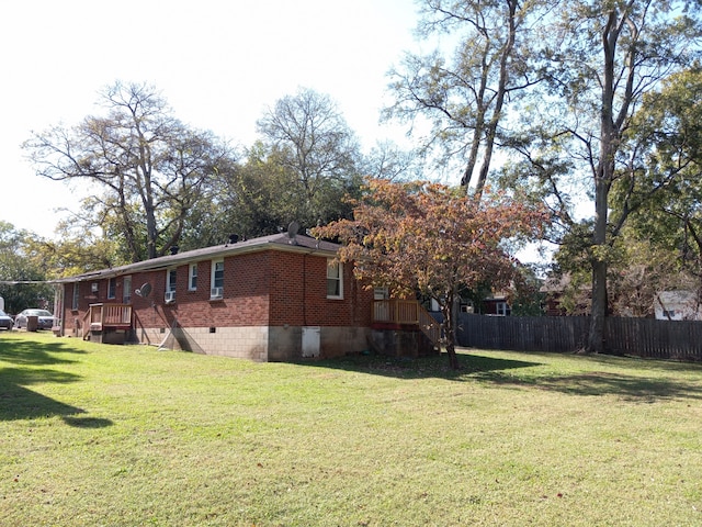 exterior space with a yard