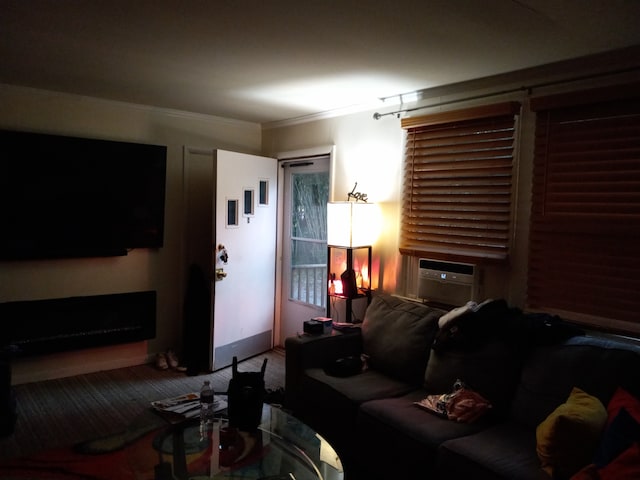 carpeted living room with ornamental molding and a wall mounted air conditioner