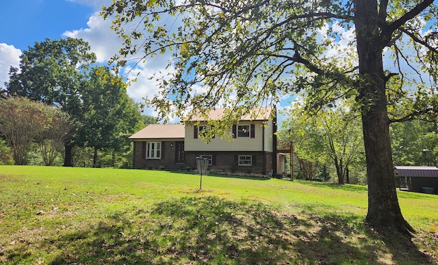 view of front of property with a front lawn