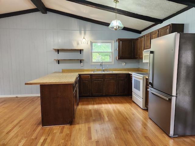 kitchen with white appliances, lofted ceiling with beams, sink, light wood-type flooring, and decorative light fixtures