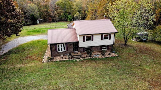 view of front of property with a front lawn