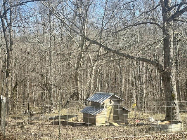 exterior space featuring an outbuilding