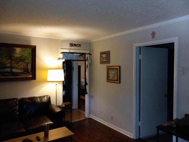 living room with ornamental molding and dark hardwood / wood-style floors