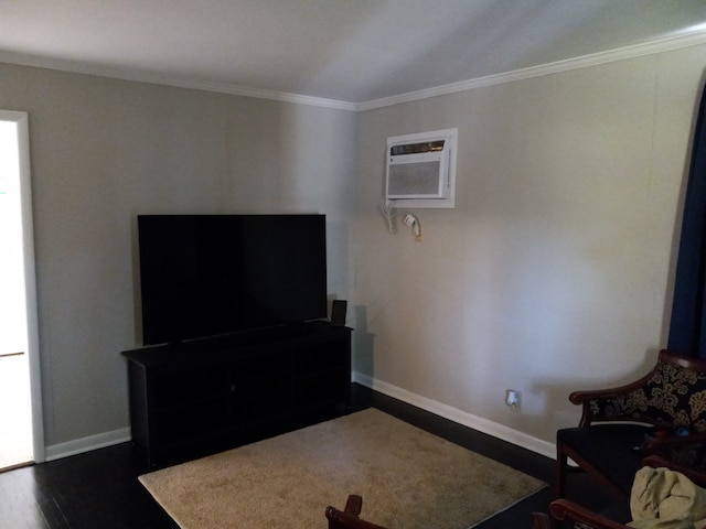 unfurnished living room with a wall unit AC, ornamental molding, and dark wood-type flooring