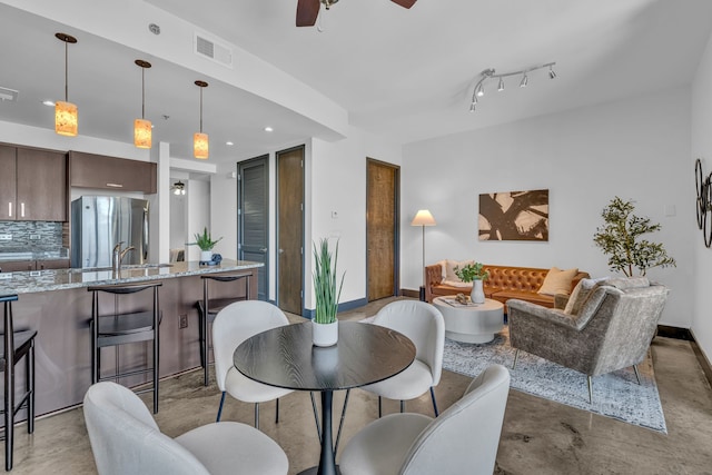 dining area featuring ceiling fan