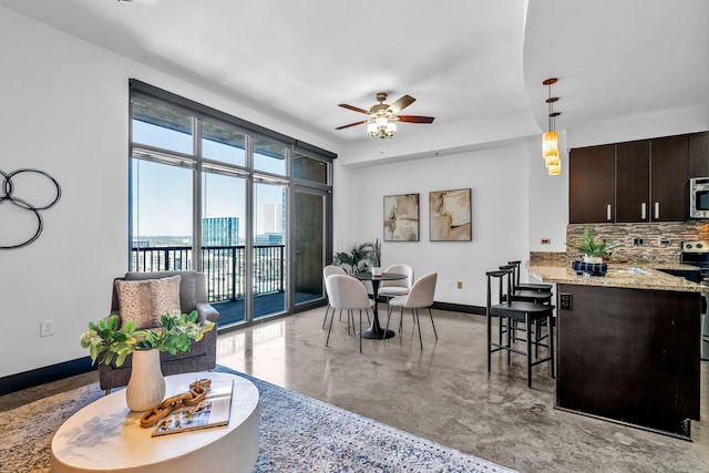 dining area featuring ceiling fan