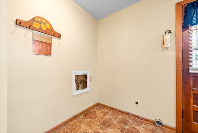 laundry area featuring electric dryer hookup, tile patterned flooring, and hookup for a washing machine