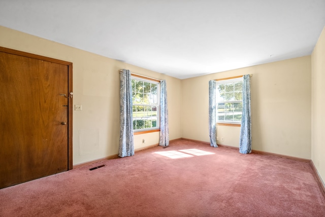 empty room featuring carpet