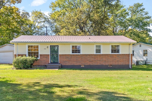 ranch-style home with a front lawn