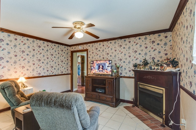 living room featuring ornamental molding, a textured ceiling, light tile patterned floors, and ceiling fan