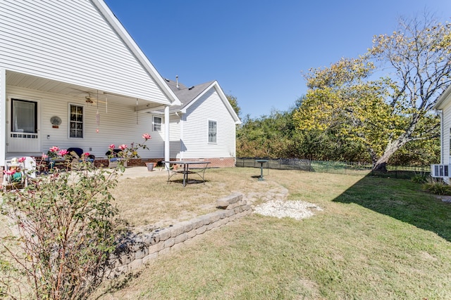 view of yard with a patio and central AC