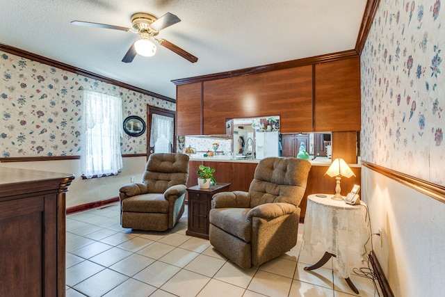 living room with crown molding, a textured ceiling, light tile patterned floors, and ceiling fan