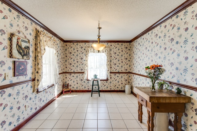 unfurnished room featuring crown molding, a textured ceiling, and light tile patterned flooring