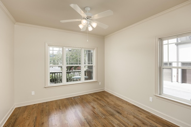 unfurnished room featuring ornamental molding, hardwood / wood-style floors, and ceiling fan