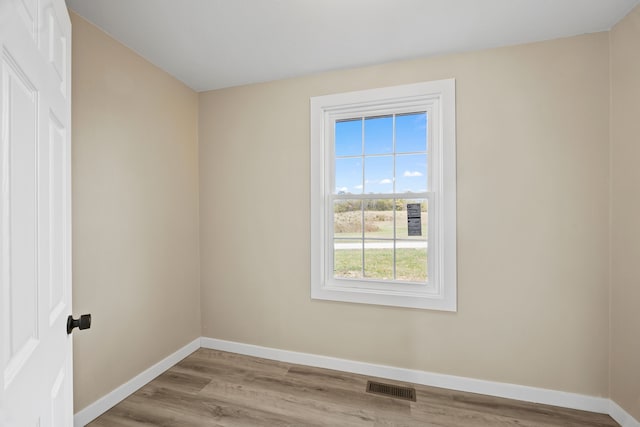 unfurnished room featuring light wood-type flooring