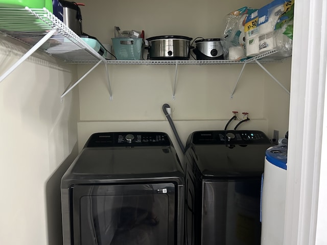 washroom featuring separate washer and dryer