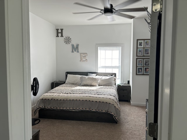 bedroom with ceiling fan and carpet