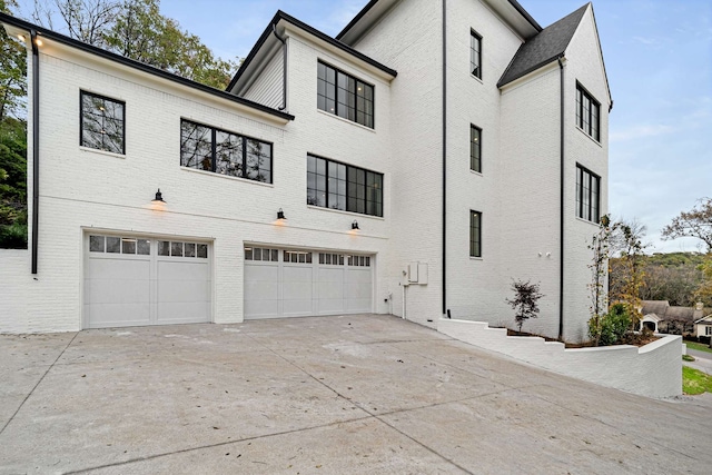 exterior space with a garage