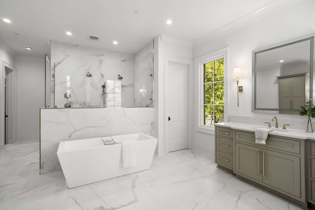 bathroom featuring vanity, ornamental molding, and shower with separate bathtub