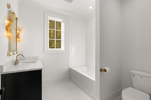 bathroom featuring a washtub, tile patterned flooring, vanity, and toilet