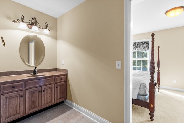 bathroom with vanity and tile patterned flooring