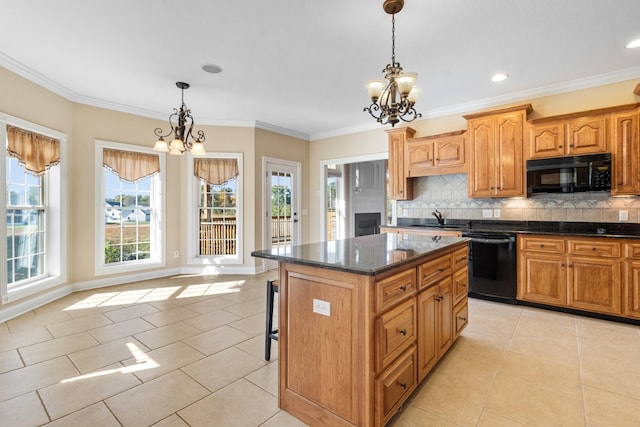 306 Gray Hawk Trl, Clarksville, TN 37043 - kitchen with light tile patterned floors, decorative backsplash, a center island, black appliances, and a notable chandelier