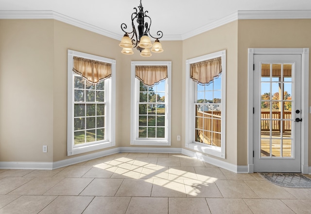 unfurnished dining area with light tile patterned floors, ornamental molding, and an inviting chandelier