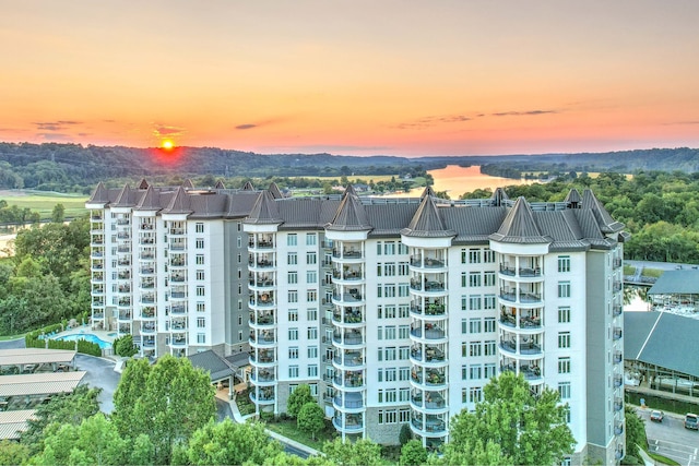 view of outdoor building at dusk