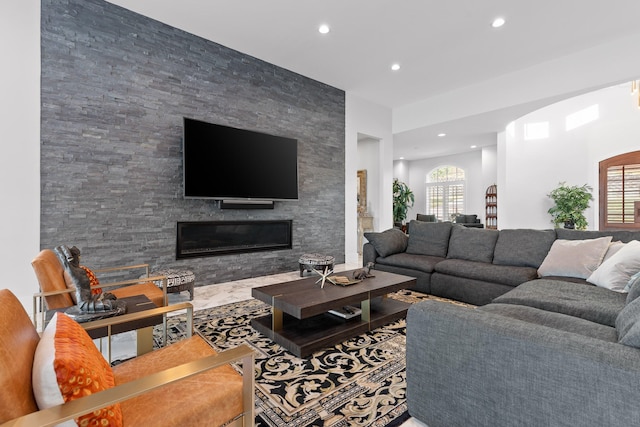 living room featuring a fireplace