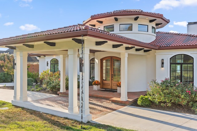 exterior space with french doors and a patio