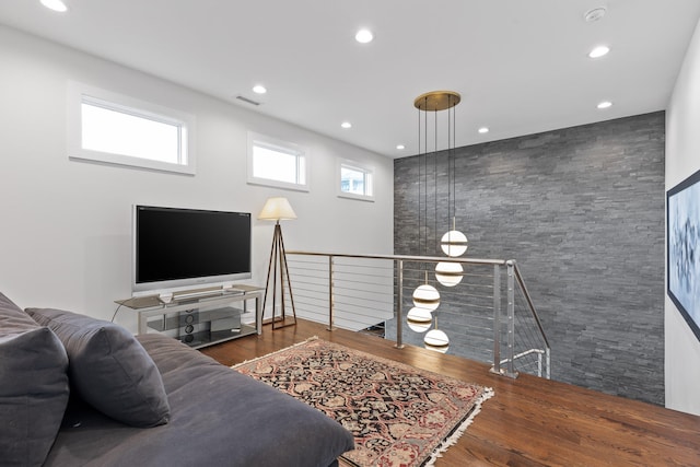 living room with dark hardwood / wood-style floors