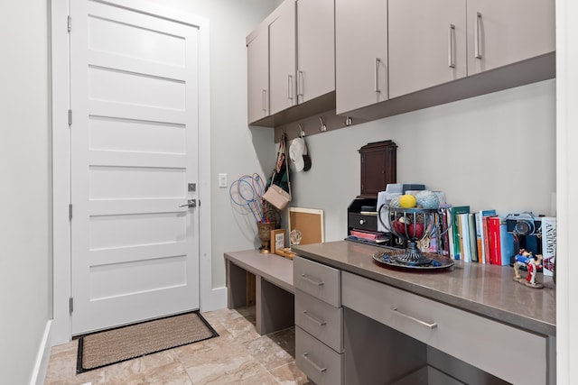 interior space featuring white cabinetry