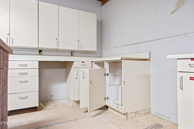 interior space featuring white cabinets