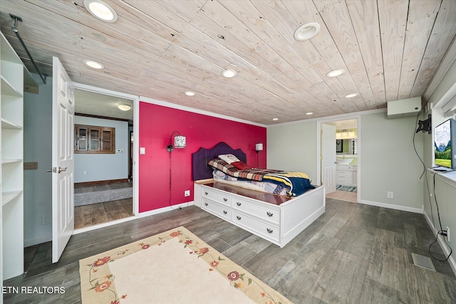 bedroom featuring dark wood-type flooring, ensuite bath, crown molding, and wooden ceiling